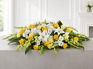 Golden Light Tribute Casket Spray