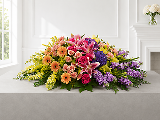 Radiant Garden Celebration Casket Spray